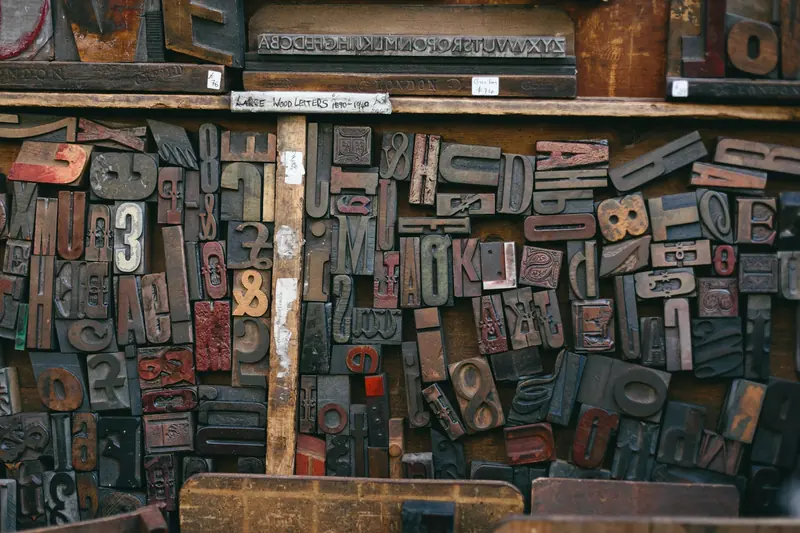 Wooden letterpress type blocks used for typesetting