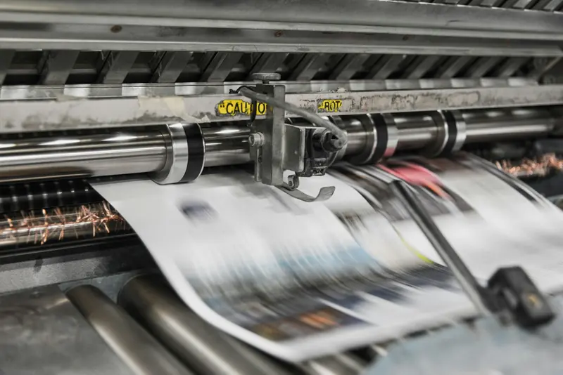 Printing press producing pages for books